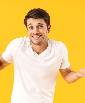 Man looking puzzled against yellow background