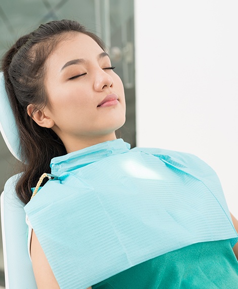 Woman relaxed under dental sedation