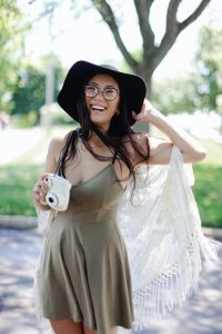 Woman wearing hat and summer dress