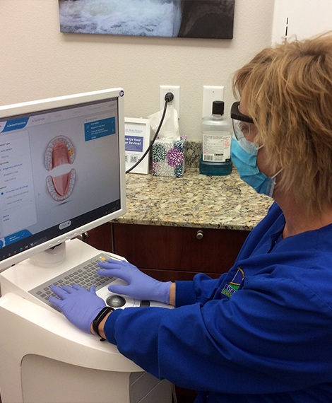 Dental patient reviewing digital denture design