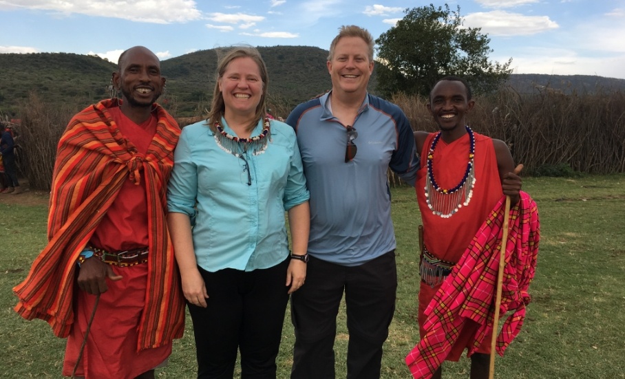 Doctor Noorda and woman smiling with two African people