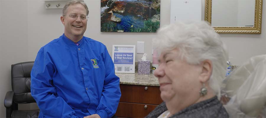 Henderson Nevada dentist Doctor Brett Noorda talking to senior dental patient