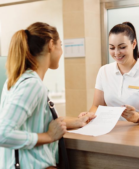 Patient turning in dental insurance forms