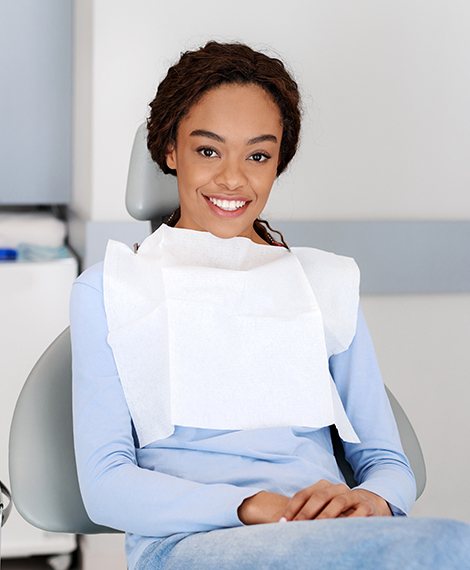 Smiling woman in dental chair