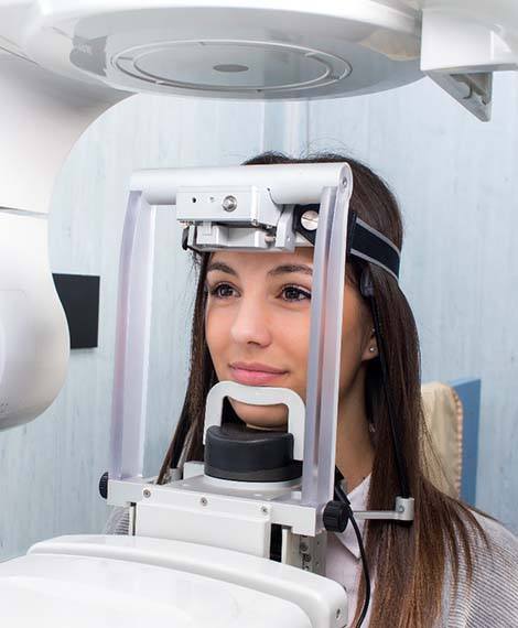 Dental patient having a 3 D scan taken of her mouth and jaw