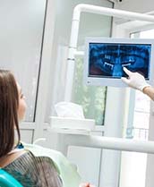 Dentist showing a patient their X rays