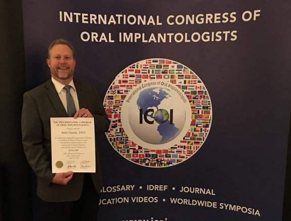 Doctor Noorda at International Congress of Oral Implantologists conference