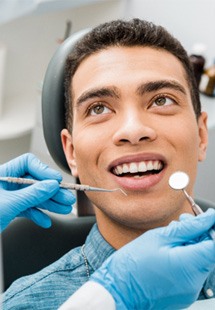 patient getting dental checkup 