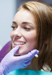 Young woman visiting cosmetic dentist