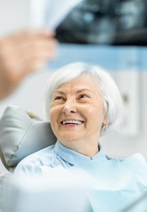 Patient talking to dentist about X ray