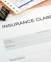 Insurance claim form and other paperwork