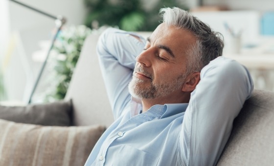 Man relaxing on couch