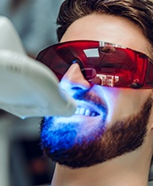 A man getting professional whitening treatment