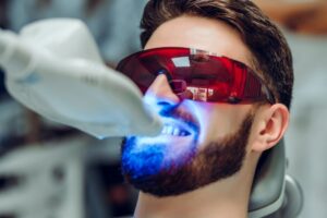 Patient having teeth whitened. 